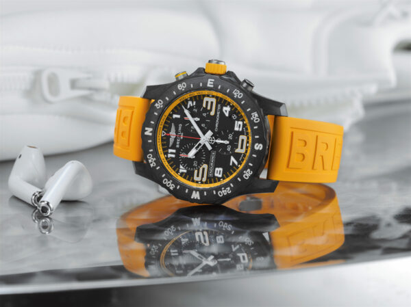 05 Endurance Pro with a yellow inner bezel and rubber strap 2048x1533 1