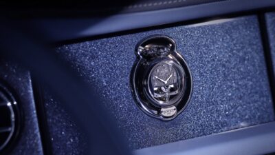 Bespoke timepiece on the dashboard high min